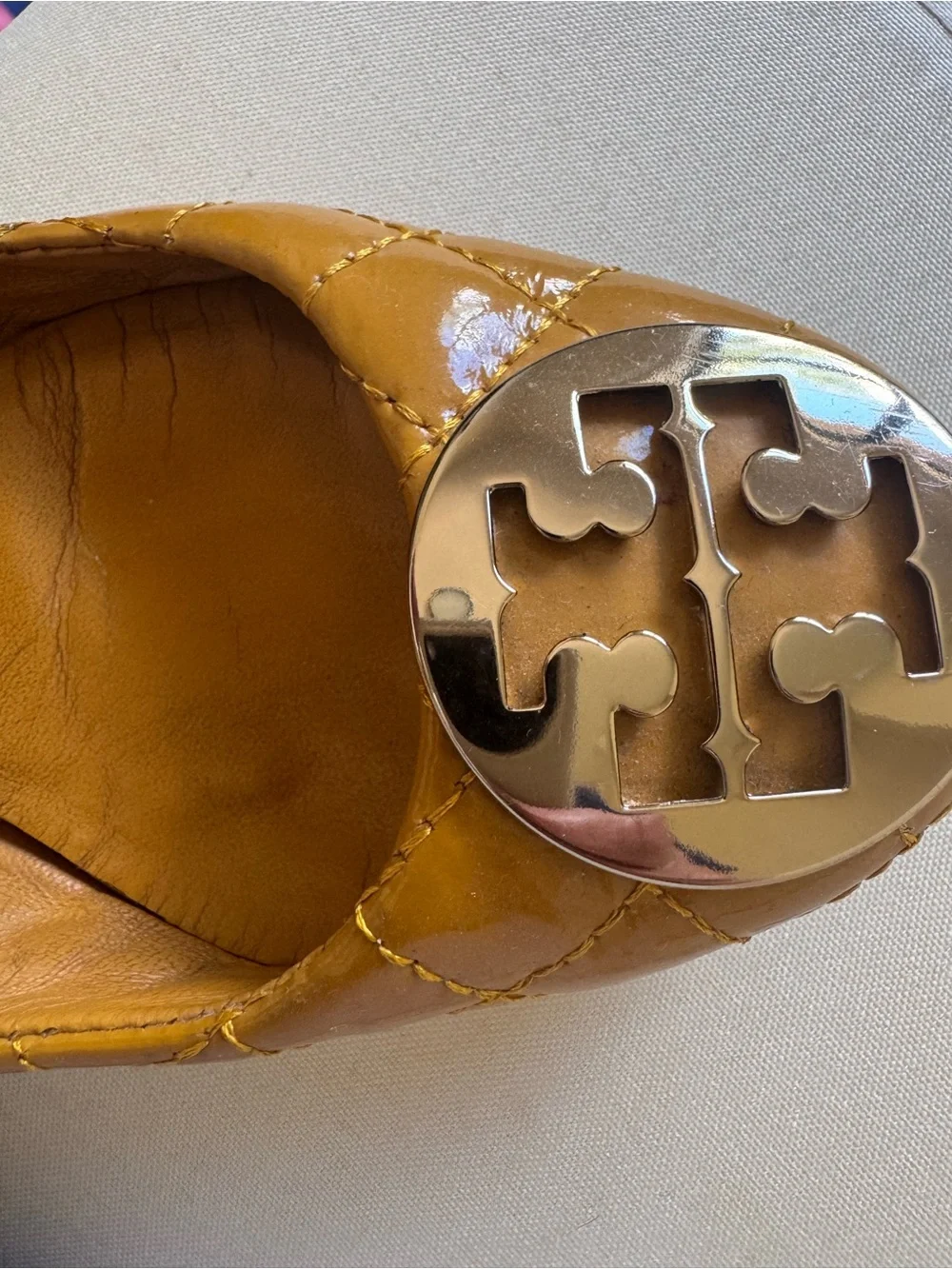 Tory Burch Quilted Mustard Leather Reva Flats with Logo Medallion
